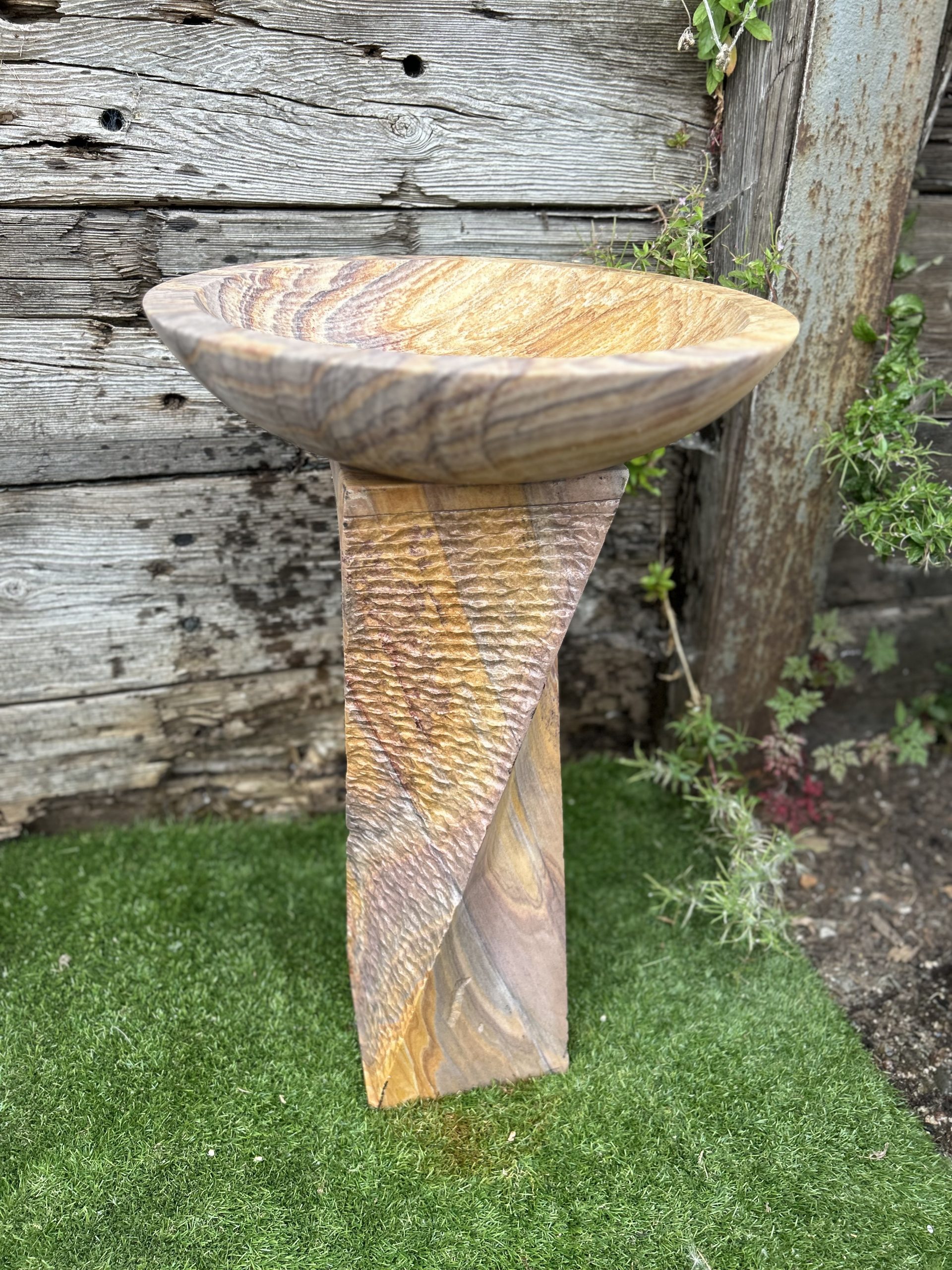 Rainbow birdbath with twisted column